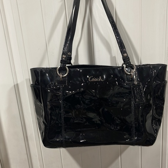 COACH Black patent, leather large purse, . Embossed,l coach purse is 17 “ 10 b